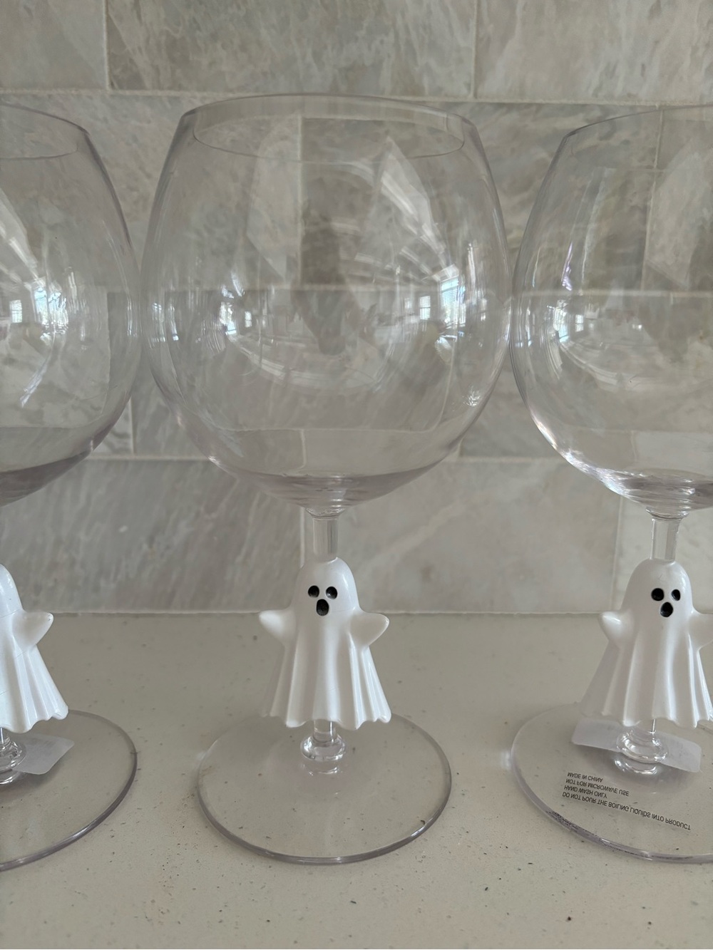 Set of 4 Mortar and Bone plastic ghost wine glasses